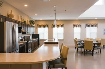 Bright common area with kitchen and dining space
