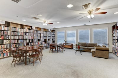 Interior view of a cozy library with bookshelves