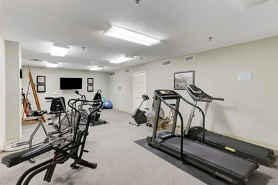 Interior view of a gym with fitness equipment