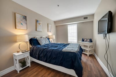 Cozy private room with a bed and TV