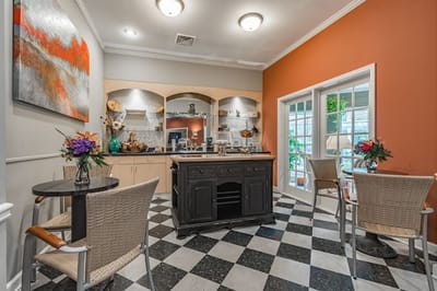 A cozy interior common area with seating and decor