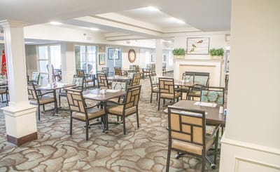 Interior view of the dining room with tables and chairs