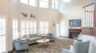 Bright, inviting common area with seating and decor