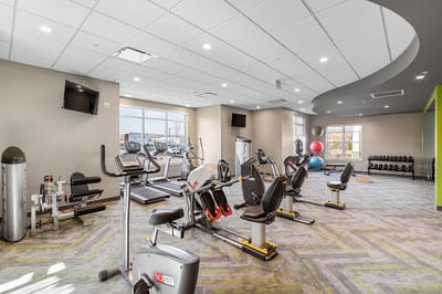 Interior view of a fitness center with gym equipment