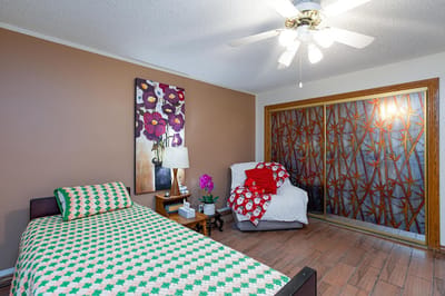 Bright private resident room with floral decor