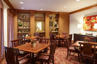 Interior view of a dining space with wooden furniture