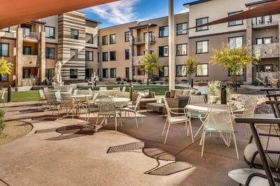 Outdoor seating area with a view of the building