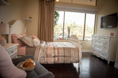 Cozy private resident room with a bed and window
