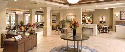 Bright common area with seating and decor