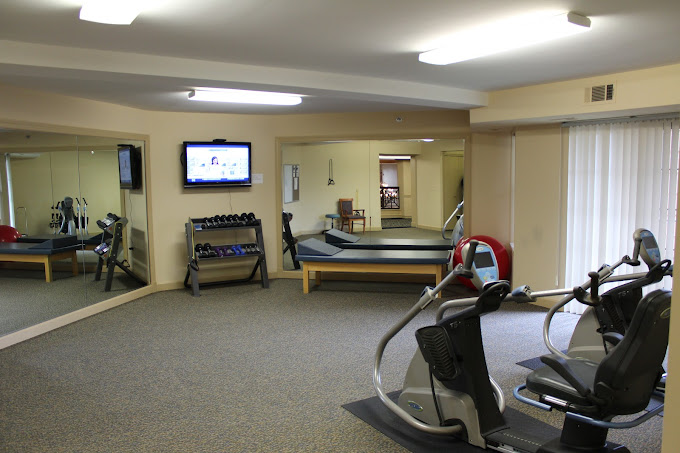 Interior view of a fitness area with exercise equipment