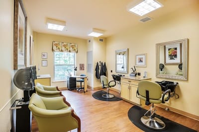 Interior view of a salon area with styling chairs