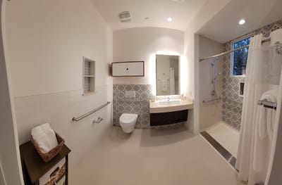 Bright and clean resident bathroom with modern fixtures