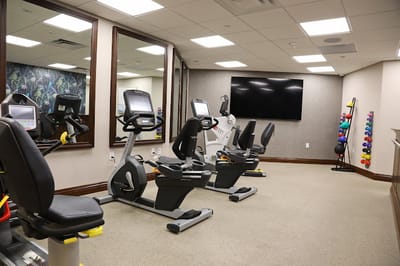 Interior view of a fitness area with exercise equipment