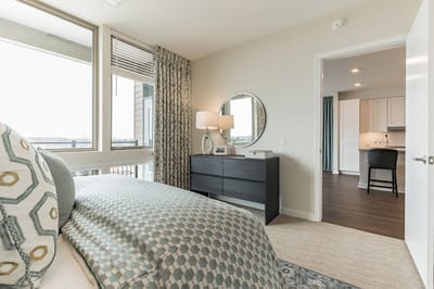Brightly decorated resident room with modern furnishings