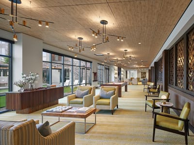 Bright interior common area with seating and decor