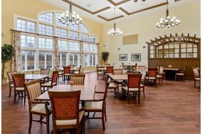 Bright dining area with tables and chairs