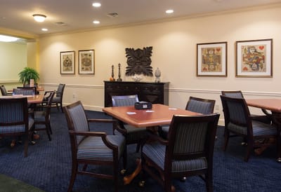 Interior common area with tables and chairs