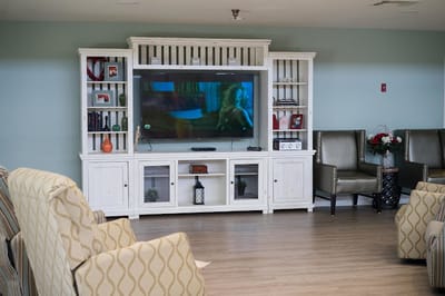Cozy common area with seating and a television