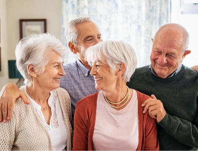 Group of smiling seniors enjoying time together