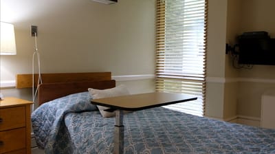 Private resident room with bed and window