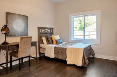 Cozy private room with a bed and desk