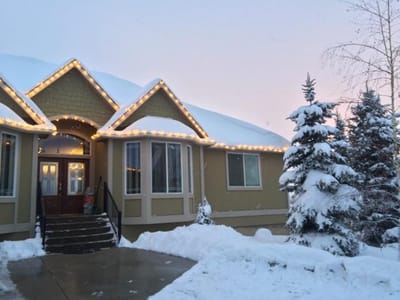 Exterior of a senior living facility decorated for winter