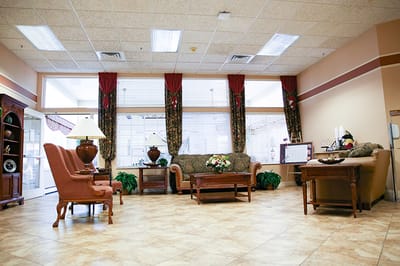Bright interior lounge area with seating and decor