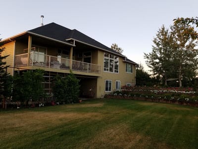 Exterior view of a residential building with a garden