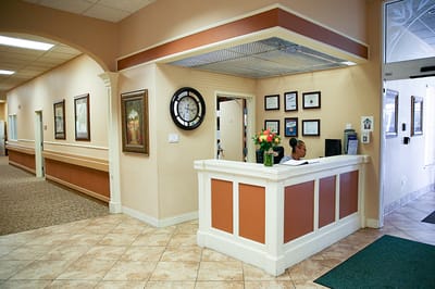 Reception area with a desk and decorative art