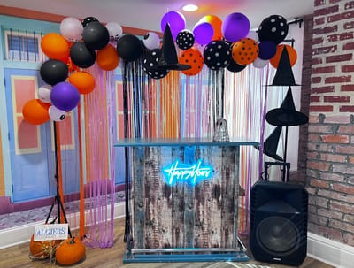 A festive bar area decorated for a Halloween event