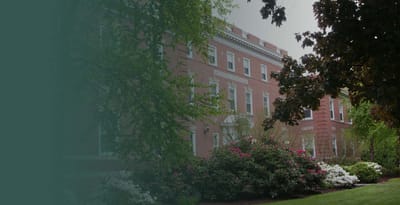 Exterior view of Homestead Hall with landscaping