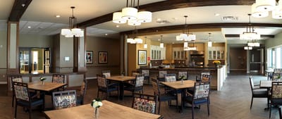 Bright dining area with tables and chairs