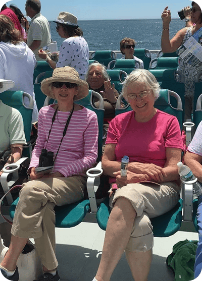 Residents enjoying a boat trip on a sunny day