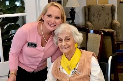 Staff member with a resident in a common area