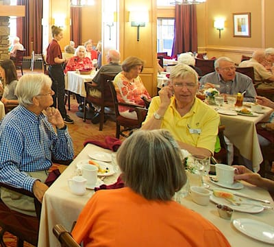 Residents enjoying a meal in the dining room