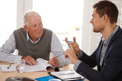 Resident and staff member engaged in conversation