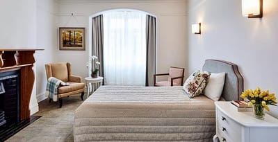 Bright and cozy resident bedroom in assisted living facility