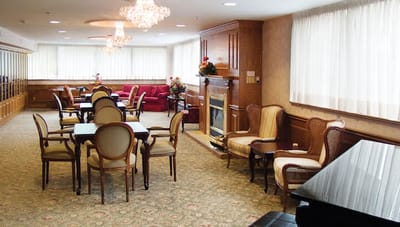 Cozy common area with seating and chandelier
