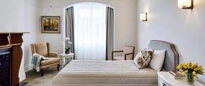 Bright and spacious resident room with furniture