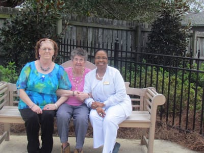 Residents and staff enjoying time together outdoors