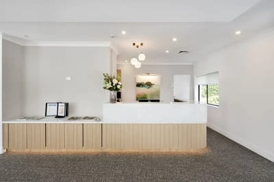 Bright reception area with decorative flowers