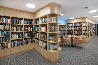Interior library space with bookshelves and seating