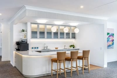 Bright interior with a modern kitchen area and seating