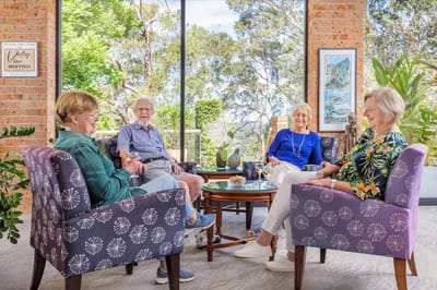 Residents socializing in a bright common area