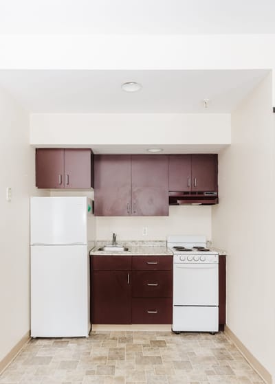 Compact kitchen area in a senior living space