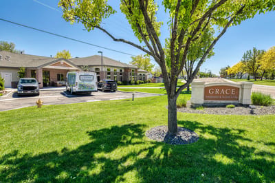Exterior view of Grace Assisted Living facility with signage
