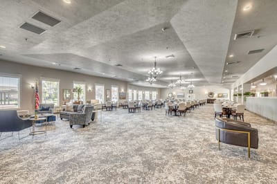 Spacious common area with seating and dining spaces