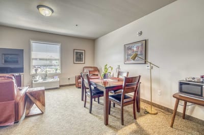 Interior living space with dining table and chairs