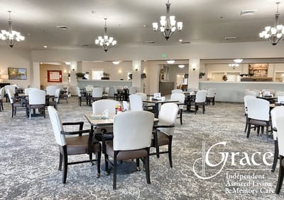 Bright dining room with tables set for meals