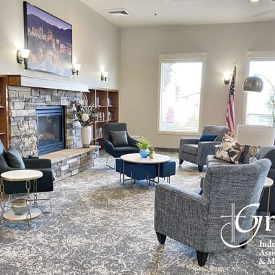 Cozy sitting area in the common room with a fireplace